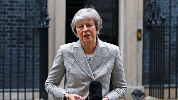 Britain's Prime Minister Theresa May addresses the media outside 10 Downing Street in London, Britain, November 22, 2018. Britain's Prime Minister Theresa May addresses the media outside 10 Downing Street in London, Britain, November 22, 2018. - Sputnik International