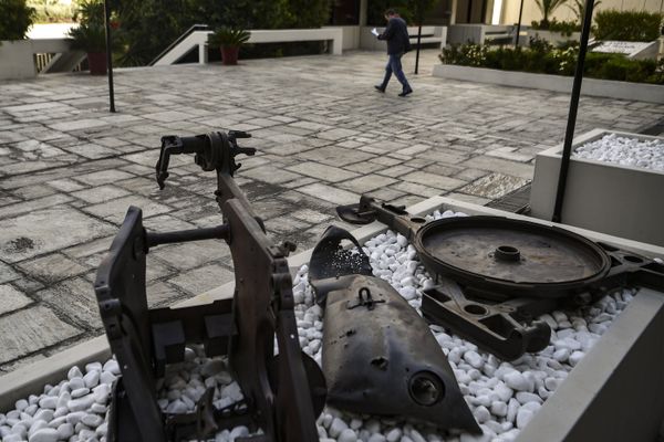 A man walks past remains of a US-made napalm bomb used in the 1944-1949 Greek Civil War - Sputnik International
