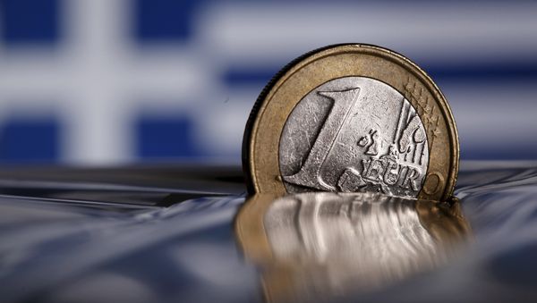 A one Euro coin is seen in this file photo illustration taken in Rome, Italy July 9, 2015 A one Euro coin is seen in this file photo illustration taken in Rome, Italy July 9, 2015 - Sputnik International