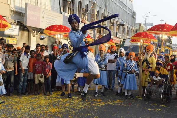 Indian Sikhs demonstrate their martial arts skills during a 'nagar keertan' (holy procession) in Secunderabad Indian Sikhs demonstrate their martial arts skills during a 'nagar keertan' (holy procession) in Secunderabad - Sputnik International