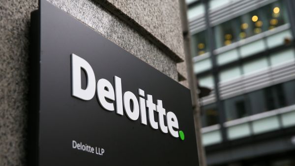 A Deloitte logo is pictured on a sign outside the company's offices in London on September 25, 2017 - Sputnik International