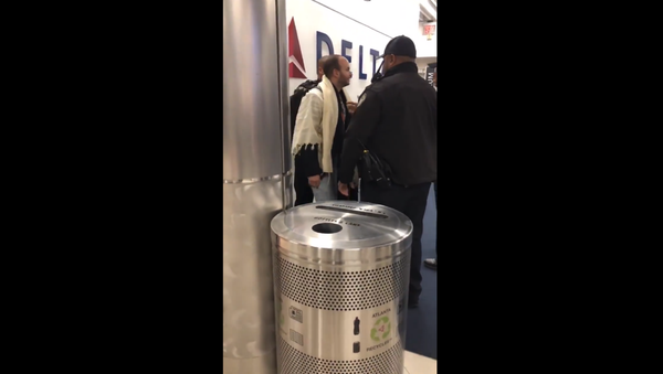 Man arrested at Georgia's Hartsfield-Jackson International Airport over his behavior on a Atlanta-bound Delta flight - Sputnik International