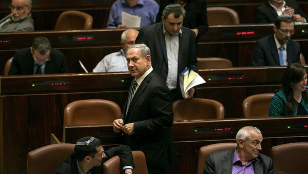 Israel's Prime Minister Benjamin Netanyahu leaves after a vote to dissolve the Israeli parliament, also known as the Knesset, in Jerusalem December 8, 2014 - Sputnik International