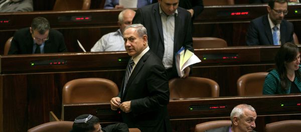 Israel's Prime Minister Benjamin Netanyahu leaves after a vote to dissolve the Israeli parliament, also known as the Knesset, in Jerusalem December 8, 2014 - Sputnik International