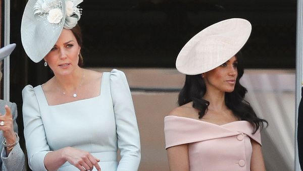 Britain's Kate, the Duchess of Cambridge, left, and Meghan, the Duchess of Sussex attend the annual Trooping the Colour Ceremony in London, Saturday, June 9, 2018.(AP Photo/Frank Augstein) - Sputnik International