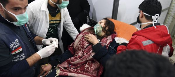 A Syrian woman receives treatment at a hospital in the regime controlled Aleppo on November 24, 2018 A Syrian woman receives treatment at a hospital in the regime controlled Aleppo on November 24, 2018 - Sputnik International