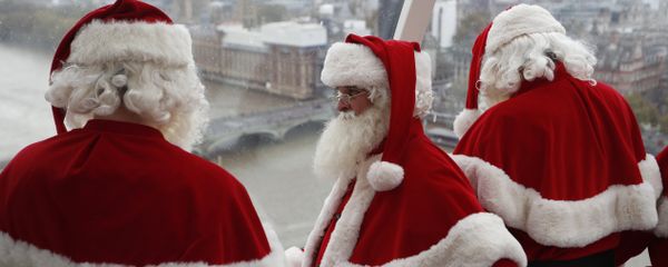 Santas from the Santa School take a look at the London skyline from a pod in the London Eye in London, Tuesday, Nov. 6, 2018. These Santas will be working in shops and malls around London as the Christmas season approaches. Santas from the Santa School take a look at the London skyline from a pod in the London Eye in London, Tuesday, Nov. 6, 2018. These Santas will be working in shops and malls around London as the Christmas season approaches. - Sputnik International