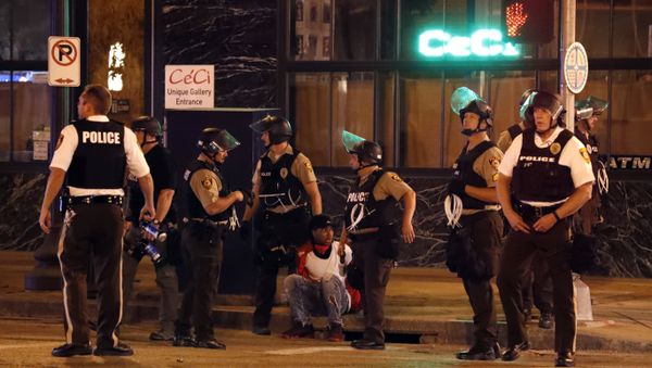 Police detain a man after a earlier peaceful protest in response to a not guilty verdict in the trial of former St. Louis police officer Jason Stockley turned violent Sunday, Sept. 17, 2017, in St. Louis. - Sputnik International