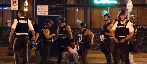 Police detain a man after a earlier peaceful protest in response to a not guilty verdict in the trial of former St. Louis police officer Jason Stockley turned violent Sunday, Sept. 17, 2017, in St. Louis. Police detain a man after a earlier peaceful protest in response to a not guilty verdict in the trial of former St. Louis police officer Jason Stockley turned violent Sunday, Sept. 17, 2017, in St. Louis. - Sputnik International