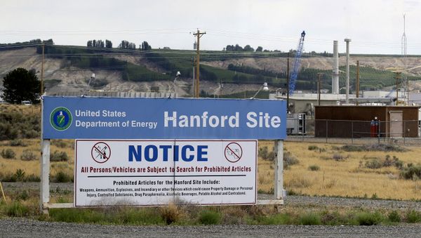 In this July 9, 2014, file photo, a sign informs visitors of prohibited items on the Hanford Nuclear Reservation near Richland, Wash - Sputnik International