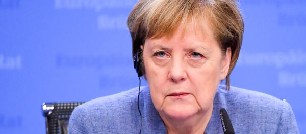 Germany's Chancellor Angela Merkel attends a press conference after a special meeting of the European Council to endorse the draft Brexit withdrawal agreement and to approve the draft political declaration on future EU-UK relations on November 25, 2018 in Brussels. Germany's Chancellor Angela Merkel attends a press conference after a special meeting of the European Council to endorse the draft Brexit withdrawal agreement and to approve the draft political declaration on future EU-UK relations on November 25, 2018 in Brussels. - Sputnik International