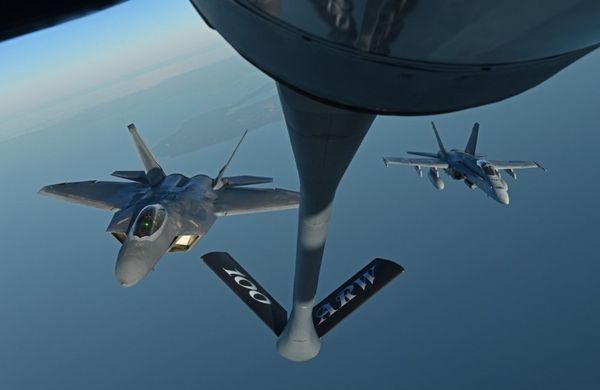 American F-22 Jets Scrambled to Escort Russian Tu-95Ms Bombers Over Neutral Waters American F-22 Jets Scrambled to Escort Russian Tu-95Ms Bombers Over Neutral Waters - Sputnik International