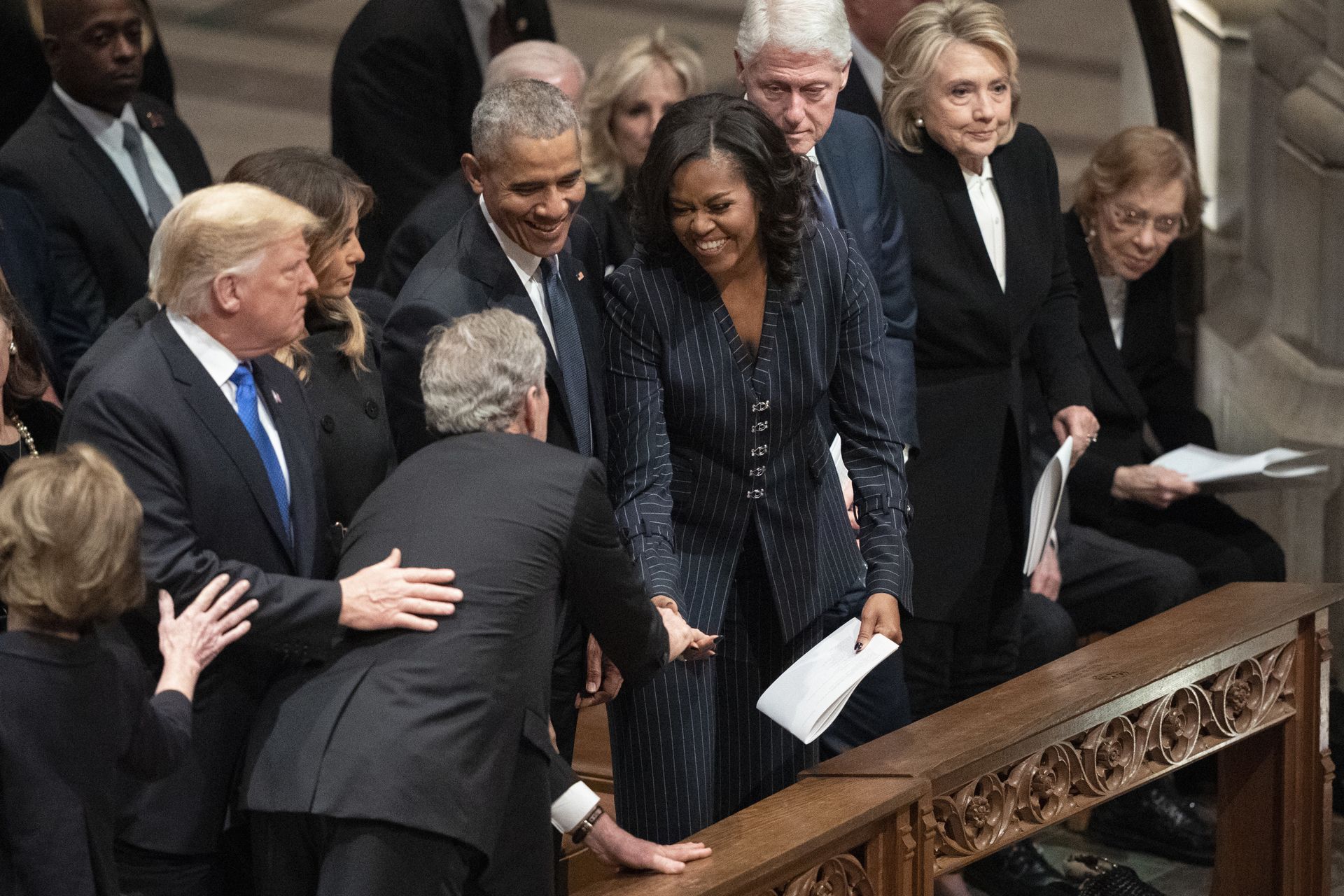 President George W. Bush and wife Laura Bush greets President Donald Trump, first lady Melania Trump, former President Barack Obama, Michelle Obama, former President Bill Clinton, former Secretary of State Hillary Clinton, former President Jimmy Carter, and Rosalynn Carter during a State Funeral for former President George H.W. Bush at the National Cathedral, Wednesday, Dec. 5, 2018, in Washington. President George W. Bush and wife Laura Bush greets President Donald Trump, first lady Melania Trump, former President Barack Obama, Michelle Obama, former President Bill Clinton, former Secretary of State Hillary Clinton, former President Jimmy Carter, and Rosalynn Carter during a State Funeral for former President George H.W. Bush at the National Cathedral, Wednesday, Dec. 5, 2018, in Washington. - Sputnik International, 1920, 20.12.2021