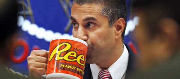 Federal Communications Commission (FCC) Chairman Ajit Pai takes a drink from a mug during an FCC meeting where the FCC voted on net neutrality, in Washington. Federal Communications Commission (FCC) Chairman Ajit Pai takes a drink from a mug during an FCC meeting where the FCC voted on net neutrality, in Washington. - Sputnik International