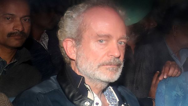 Christian Michel, a key accused and alleged middleman in India's abortive, scandal-tainted helicopter deal with Anglo-Italian firm Agusta Westland, is pictured inside a police vehicle outside a court in New Delhi, India, December 5, 2018 Christian Michel, a key accused and alleged middleman in India's abortive, scandal-tainted helicopter deal with Anglo-Italian firm Agusta Westland, is pictured inside a police vehicle outside a court in New Delhi, India, December 5, 2018 - Sputnik International