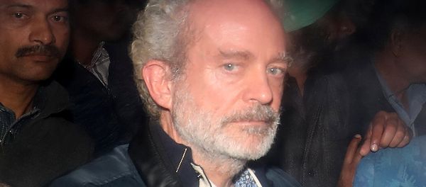 Christian Michel, a key accused and alleged middleman in India's abortive, scandal-tainted helicopter deal with Anglo-Italian firm Agusta Westland, is pictured inside a police vehicle outside a court in New Delhi, India, December 5, 2018 - Sputnik International
