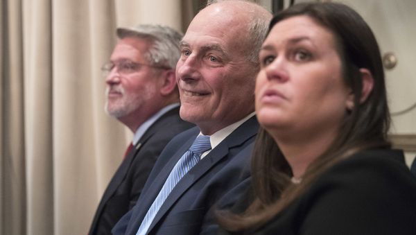 Communications Chief Bill Shine, left, Chief of Staff John Kelly, center, White House Press Secretary Sarah Huckabee Sanders listen as President Donald Trump speaks during a news conference, Wednesday, Sept. 26, 2018, in New York - Sputnik International