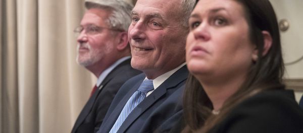 Communications Chief Bill Shine, left, Chief of Staff John Kelly, center, White House Press Secretary Sarah Huckabee Sanders listen as President Donald Trump speaks during a news conference, Wednesday, Sept. 26, 2018, in New York - Sputnik International
