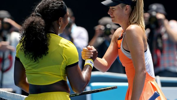 Serena Williams, left, of the United States is congratulated by Maria Sharapova of Russia after winning their quarterfinal match at the Australian Open tennis championships in Melbourne, Australia, Tuesday, Jan. 26, 2016 - Sputnik International