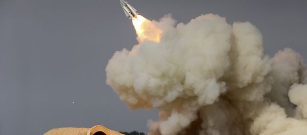 In this Dec. 29, 2016 file photo, released by the semi-official Iranian Students News Agency (ISNA), a long-range S-200 missile is fired in a military drill in the port city of Bushehr, on the northern coast of Persian Gulf, Iran - Sputnik International