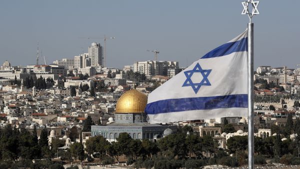 The Israeli flag flutters in front of the Dome of the Rock mosque and the city of Jerusalem, on December 1, 2017 The Israeli flag flutters in front of the Dome of the Rock mosque and the city of Jerusalem, on December 1, 2017 - Sputnik International