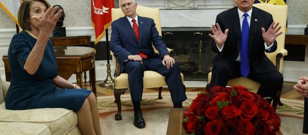 Vice President Mike Pence, center, listens as President Donald Trump argues with House Minority Leader Rep. Nancy Pelosi, D-Calif., during a meeting in the Oval Office of the White House, Tuesday, Dec. 11, 2018, in Washington. - Sputnik International