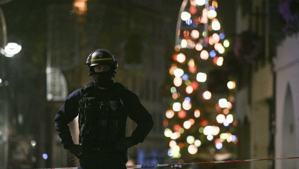 A policeman patrols in the rue des Grandes Arcades in Strasbourg, eastern France, after a shooting breakout, on December 11, 2018. - Sputnik International