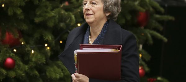 Britain's Prime Minister Theresa May leaves 10 Downing Street to attend the weekly Prime Ministers' Questions session, at parliament in London, Wednesday, Dec. 12, 2018. May has confirmed there will be a vote of confidence in her leadership of the Conservative Party, in Parliament Wednesday evening, with the result expected to be announced soon after. Britain's Prime Minister Theresa May leaves 10 Downing Street to attend the weekly Prime Ministers' Questions session, at parliament in London, Wednesday, Dec. 12, 2018. May has confirmed there will be a vote of confidence in her leadership of the Conservative Party, in Parliament Wednesday evening, with the result expected to be announced soon after. - Sputnik International