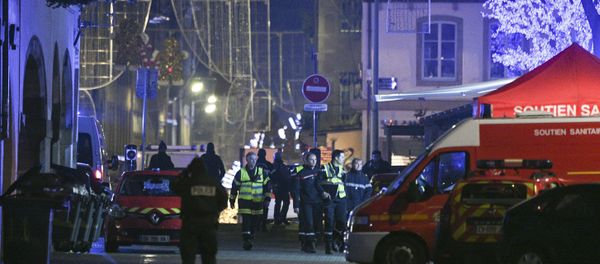Policemen and emergency medical response vehicules are seen in the rue des Grandes Arcades in Strasbourg, eastern France, after a shooting breakout, on December 11, 2018. Policemen and emergency medical response vehicules are seen in the rue des Grandes Arcades in Strasbourg, eastern France, after a shooting breakout, on December 11, 2018. - Sputnik International