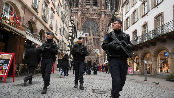 French policemen patrol during the reopening of the christmas market of Strasbourg, eastern France, on December 14, 2018 as the author of the attack was killed on December 13, 2018. French policemen patrol during the reopening of the christmas market of Strasbourg, eastern France, on December 14, 2018 as the author of the attack was killed on December 13, 2018. - Sputnik International