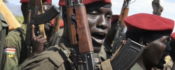 In this photo taken Thursday, April 14, 2016, government soldiers follow orders to raise their guns during a military parade in Juba, South Sudan In this photo taken Thursday, April 14, 2016, government soldiers follow orders to raise their guns during a military parade in Juba, South Sudan - Sputnik International