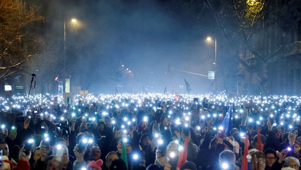 People take part in a protest against a proposed new labour law in Budapest, Hungary, December 16, 2018 People take part in a protest against a proposed new labour law in Budapest, Hungary, December 16, 2018 - Sputnik International