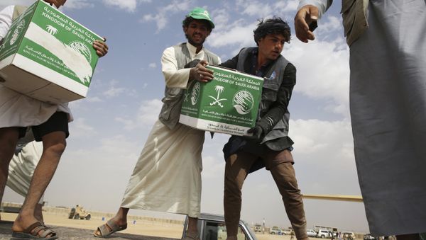 In this Saturday, Feb. 3, 2018 photograph, relief workers unload aid carried into Yemen by the Saudi military in Marib, Yemen In this Saturday, Feb. 3, 2018 photograph, relief workers unload aid carried into Yemen by the Saudi military in Marib, Yemen - Sputnik International