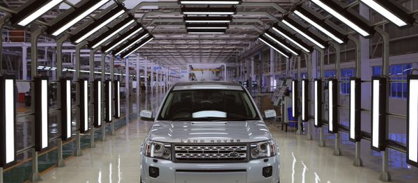 A Jaguar Land Rover car sits at an assembly plant in Pune, India A Jaguar Land Rover car sits at an assembly plant in Pune, India - Sputnik International