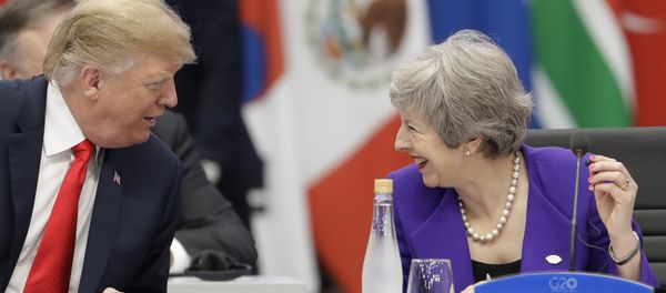 Britain's Prime Minister Theresa May, right, speaks with President Donald Trump during the G20 summit in Buenos Aires, Argentina, Friday, Nov. 30, 2018 - Sputnik International