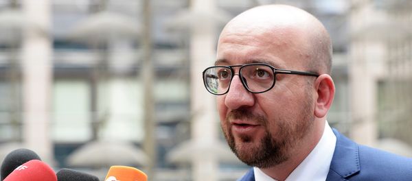 Belgian Prime Minister Charles Michel answers journalists' questions as he arrives for a meeting in Brussels of the leaders of the 19 countries that use the euro, on July 12, 2015. - Sputnik International