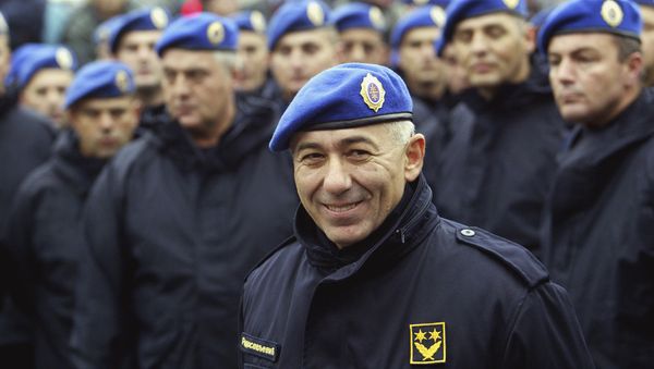 In this photo taken Oct. 24, 2003, former Police Gen. Goran Radosavljevic Guri stands in front of Serbia's elite police troops during a protest in downtown Belgrade, Serbia. - Sputnik International