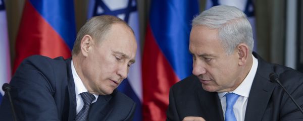 Russian President Vladimir Putin, left, speaks with Israeli Prime Minister Benjamin Netanyahu as they prepare to deliver joint statements after their meeting and a lunch in the Israeli leader's Jerusalem residence, Monday, June 25, 2012 Russian President Vladimir Putin, left, speaks with Israeli Prime Minister Benjamin Netanyahu as they prepare to deliver joint statements after their meeting and a lunch in the Israeli leader's Jerusalem residence, Monday, June 25, 2012 - Sputnik International