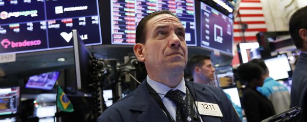 In this Dec. 6, 2018, file photo trader Tommy Kalikas works on the floor of the New York Stock Exchange. - Sputnik International