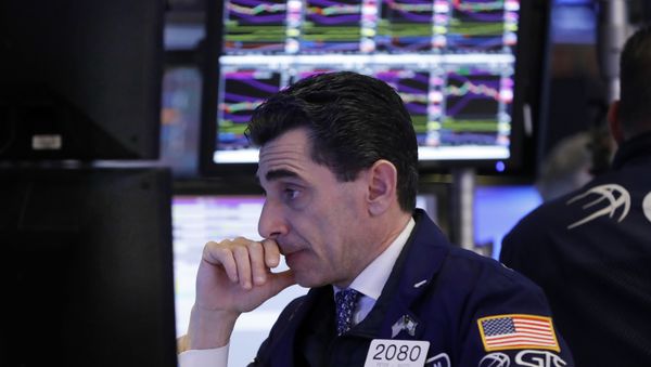 In this Dec. 6, 2018, specialist Peter Mazza works at his post on the floor of the New York Stock Exchange. - Sputnik International