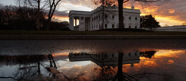 The sun rises behind the White House in Washington, Saturday, Dec. 22, 2018. Hundreds of thousands of federal workers faced a partial government shutdown early Saturday after Democrats refused to meet President Donald Trump's demands for $5 billion to start erecting a border wall with Mexico The sun rises behind the White House in Washington, Saturday, Dec. 22, 2018. Hundreds of thousands of federal workers faced a partial government shutdown early Saturday after Democrats refused to meet President Donald Trump's demands for $5 billion to start erecting a border wall with Mexico - Sputnik International
