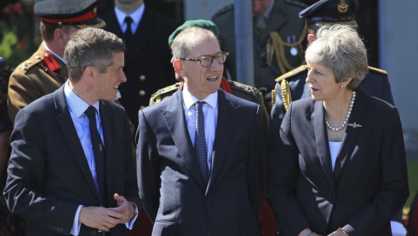 Secretary of State for Defence, Gavin Williamson, left, and Prime Minister Theresa May with her husband Philip, centre, during celebrations marking National Armed Forces Day in Llandudno, Wales, Saturday June 30, 2018. Secretary of State for Defence, Gavin Williamson, left, and Prime Minister Theresa May with her husband Philip, centre, during celebrations marking National Armed Forces Day in Llandudno, Wales, Saturday June 30, 2018. - Sputnik International