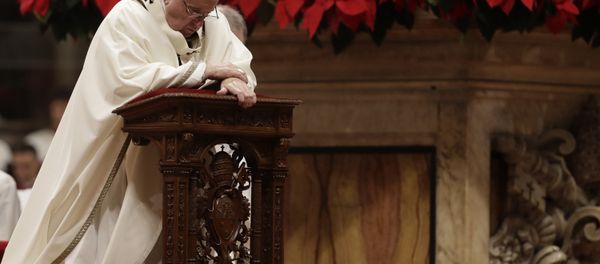 Pope Francis kneels on the altar as he celebrates the Christmas Eve Mass in St. Peter's Basilica at the Vatican, Monday, Dec. 24, 2018 Pope Francis kneels on the altar as he celebrates the Christmas Eve Mass in St. Peter's Basilica at the Vatican, Monday, Dec. 24, 2018 - Sputnik International