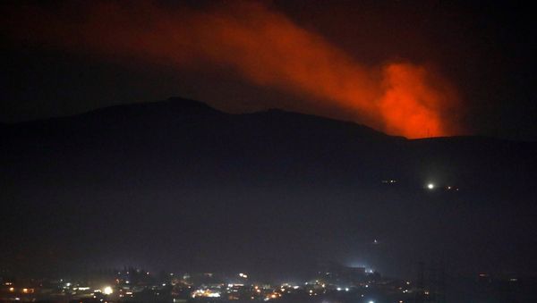 Smoke rises past a mountain as seen from Damascus countryside, Syria December 25, 2018 - Sputnik International
