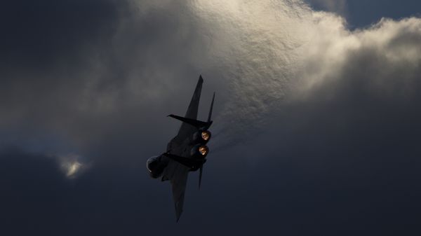 Israeli Air Force F-15 plane performs during a graduation ceremony for new pilots in the Hatzerim air force base near the city of Beersheba, Israel, Thursday, Dec. 29, 2016 - Sputnik International