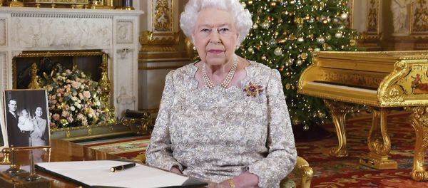 In this photo released on Monday, Dec. 24, 2018, Queen Elizabeth II poses after she recorded her annual Christmas Day message, in the White Drawing Room of Buckingham Palace in central London In this photo released on Monday, Dec. 24, 2018, Queen Elizabeth II poses after she recorded her annual Christmas Day message, in the White Drawing Room of Buckingham Palace in central London - Sputnik International