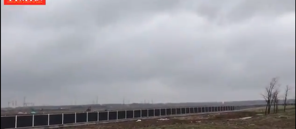At Tesla's new Gigafactory in Lingang, Shanghai, shows no signs of ongoing construction work. The company signed a land leasing contract with local Shanghai authorities to build the factory on October 17. - Sputnik International
