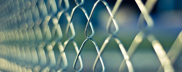 A chainlink prison outside a jail A chainlink prison outside a jail - Sputnik International
