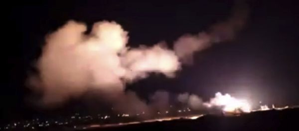 This frame grab from a video provided by the Syrian official news agency SANA shows missiles flying into the sky near Damascus, Syria, 25 December - Sputnik International