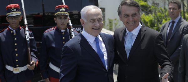 Israeli Prime Minister Benjamin Netanyahu, left center, is received by Brazil's President-elect Jair Bolsonaro at the military base Fort Copacabana, in Rio de Janeiro, Brazil, Friday, Dec. 28, 2018. - Sputnik International